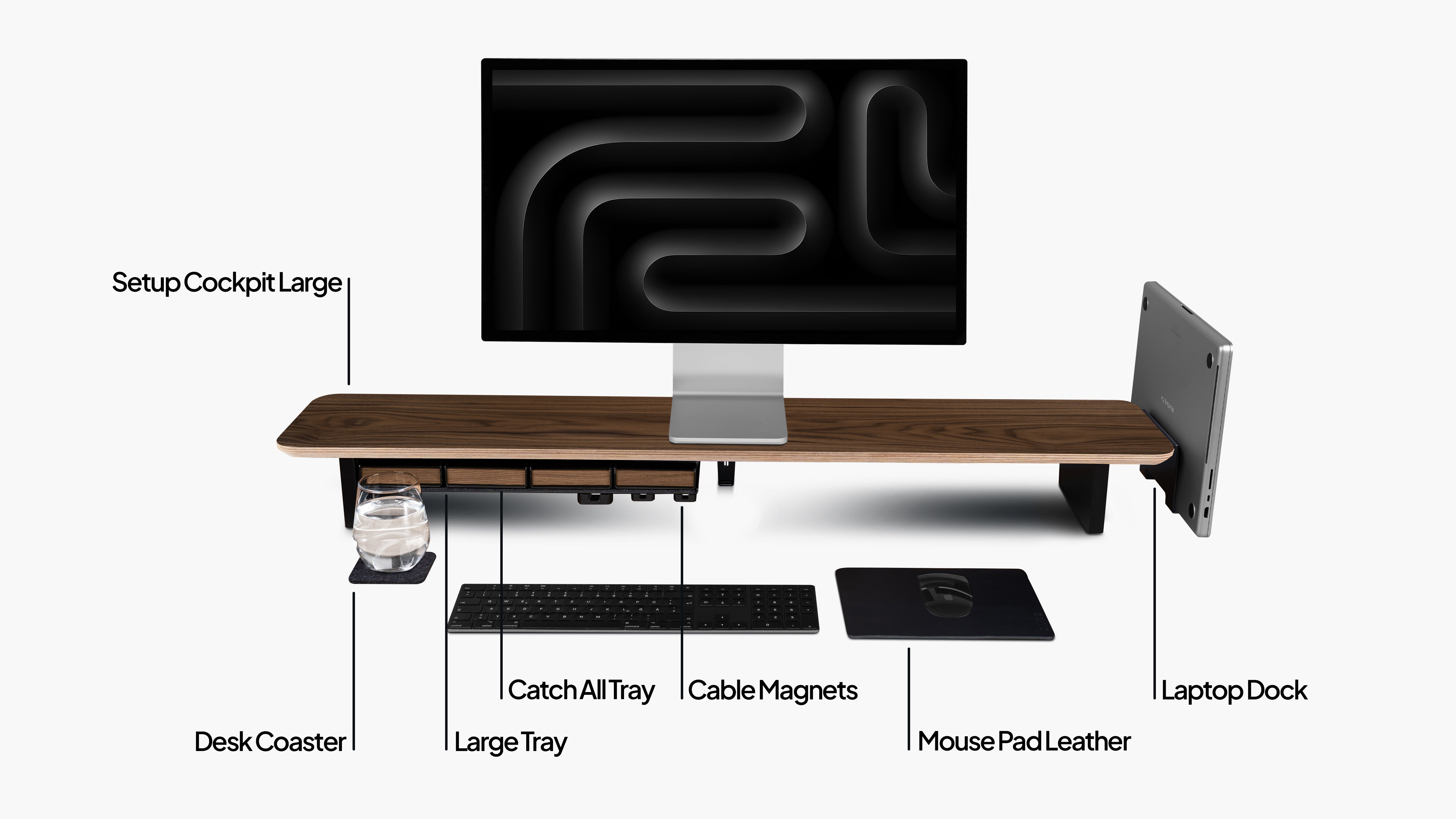 Setup Cockpit Desk Shelf Large in American Walnut, as a bundle set with add-ons: Laptop Dock, Large Tray, Catch all Trays, cable magnets and desk pad. Labeled for illustration purposes.